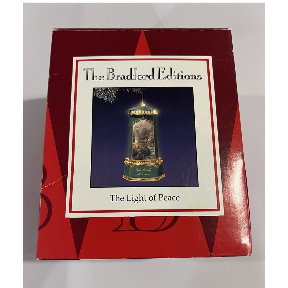 The Bradford Editions Thomas Kinkade The Light of Peace Lighthouse Ornament
